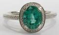 032181 168CT OVAL CUT EMERALD AND DIAMOND RING