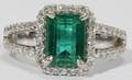 032175 244 CT NATURAL EMERALD  15 CT DIAMOND RING