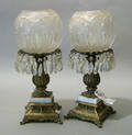 Pair of gilt metal table lamps with cut glass shades and prisms