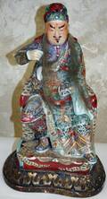 052231 CHINESE PORCELAIN SEATED FIGURE ON WOODEN BASE
