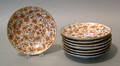Eight Chinese export orange butterfly plates