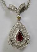 052281 125 CT NATURAL RUBY  150 CT DIAMOND PENDANT