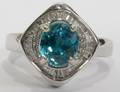 032309 43CT BLUE ZIRCON AND DIAMOND 14KT WGOLD RING