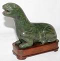 051449 CHINESE GREEN HARD STONE FIGURE OF A SEAL