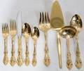 041568 ONEIDA GILT STAINLESS FLATWARE 64 PIECES