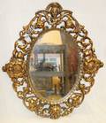 122541 METAL MIRROR WITH CHERUB MASK H 21 W 18