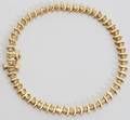 050036 14KT YELLOW GOLD AND DIAMOND TENNIS BRACELET