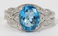 022056 424 CT BLUE TOPAZ  DIAMOND RING SET IN 14KT