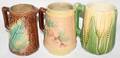 061143 MAJOLICA PITCHERS 19TH C THREE H 5 34