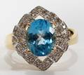 14KT YELLOW GOLD DIAMOND AND BLUE TOPAZ RING