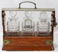 091137 ENGLISH TANTALUS SET WITH CRYSTAL DECANTERS