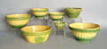 Seven pottery mixing bowls