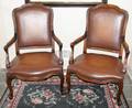 062184 THEODORE ALEXANDER WOOD  LEATHER ARMCHAIRS