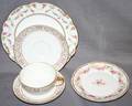 LIMOGES PORCELAIN TEACUPS SAUCERS  PLATES 36