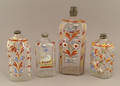Four colorless glass flasks mid 19th c