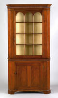 Pennsylvania cherry two part corner cupboard early 19th c