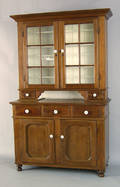 Pennsylvania walnut two part Dutch cupboard 19th c
