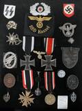 070249 WWII GERMAN MILITARY BADGES AND MEDALS 22 PCS