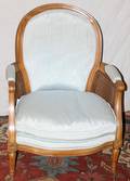 112395 LOUIS XVI STYLE WALNUT ARMCHAIR MID 20TH C