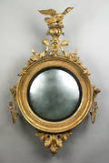 Massive giltwood convex mirror early 19th c
