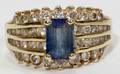 110419 14KT YGOLD DIAMOND AND BLUE GEMSTONE RING