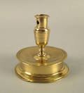 Brass capstan candlestick mid 17th c
