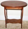 WALNUT OVAL END TABLE H 30 W 20 L 30