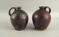 Two redware ovoid jugs 19th c