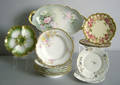 Twelve Limoges plates