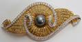 102052 18 KT YELLOW GOLD DIAMOND  BLACK PEARL BROOCH