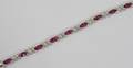 072055 18KT WHITE GOLD DIAMOND AND RUBY BRACELET
