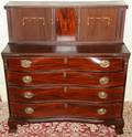102204 MAHOGANY INLAID SERPENTINE TAMBOUR DESK