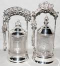 121317 SILVERPLATE  PRESSED GLASS PICKLE CASTERS