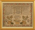 English silk on linen sampler dated 1827 wrought by Charlotte Clulee