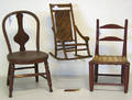 Three wooden doll chairs to include a rocker with splint seat