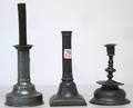 Two pewter candlesticks
