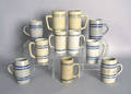 Eleven German stoneware mugs