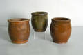Three redware crocks