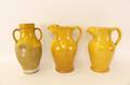 Three Yellow Glazed Ceramic Vessels