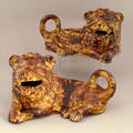 Pair of Rockingham glaze recumbent lion figures 19th c