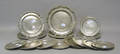 Fourteen pewter plates