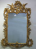 Carved and gilded mirror