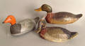 Three carved and painted duck decoys