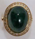 102185 152CT EMERALD  12CT DIAMOND RING