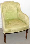 112330 ENGLISH GREEN UPHOLSTERED CHAIR ON CASTERS