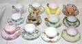 111504 PORCELAIN TEA CUPS  SAUCERS  POT DE CRME