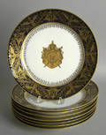 Eight Sevres cobalt and gilt decorated plates