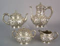 Sterling silver four piece repousse tea service late 19th c