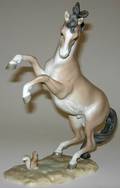 113469 NAO PORCELAIN REARING STALLION H10 W8