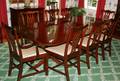 031062 MAHOGANY DOUBLEPEDESTAL TABLE  TEN CHAIRS